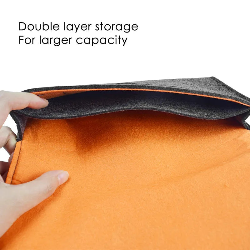 Black felt pouch for Nintendo Switch console with game card slots and accessory compartments