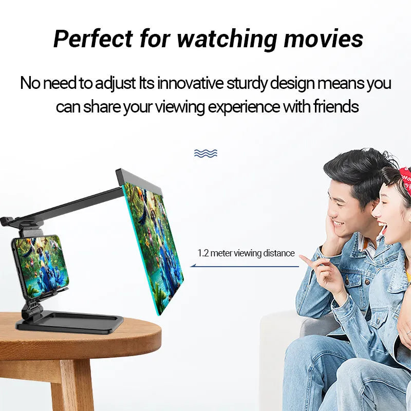 Black folding mobile phone screen amplifier with detachable holder next to an iPhone.