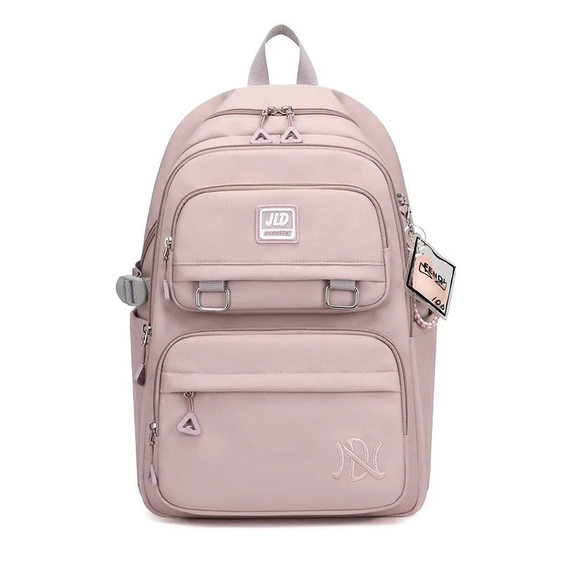 Girls large capacity nylon school backpack in assorted colours with physiological curve backplate