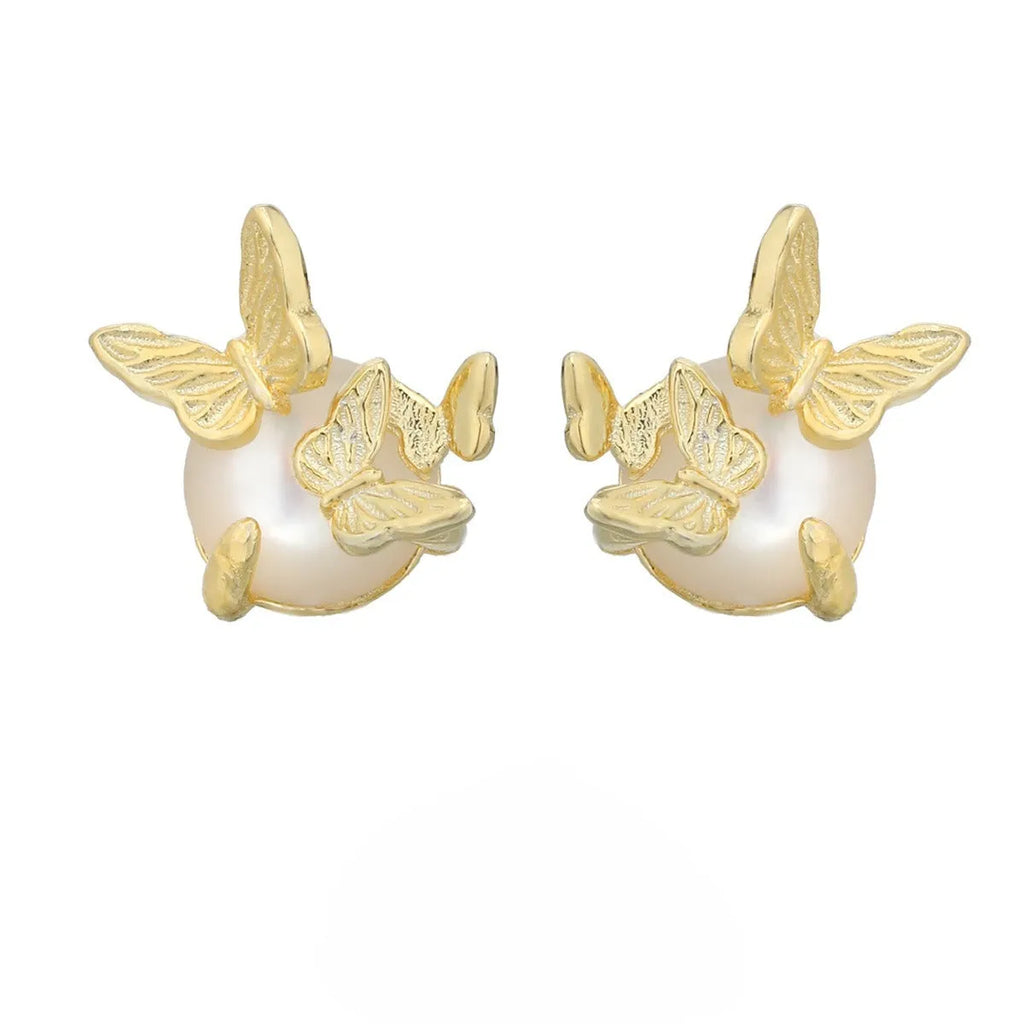 A pair of butterfly-shaped stud earrings in 925 silver with a gold electroplated finish.