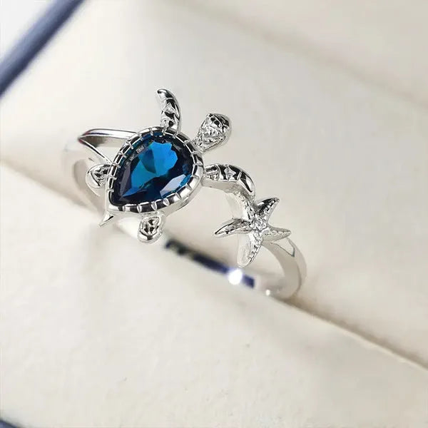 Blue alloy ring with turtle and starfish designs, women's vacation style, size 6-10