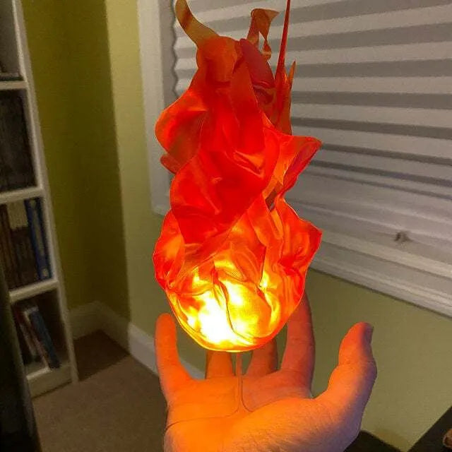 Halloween floating fireball LED prop in grey with rounded flame edges and strap