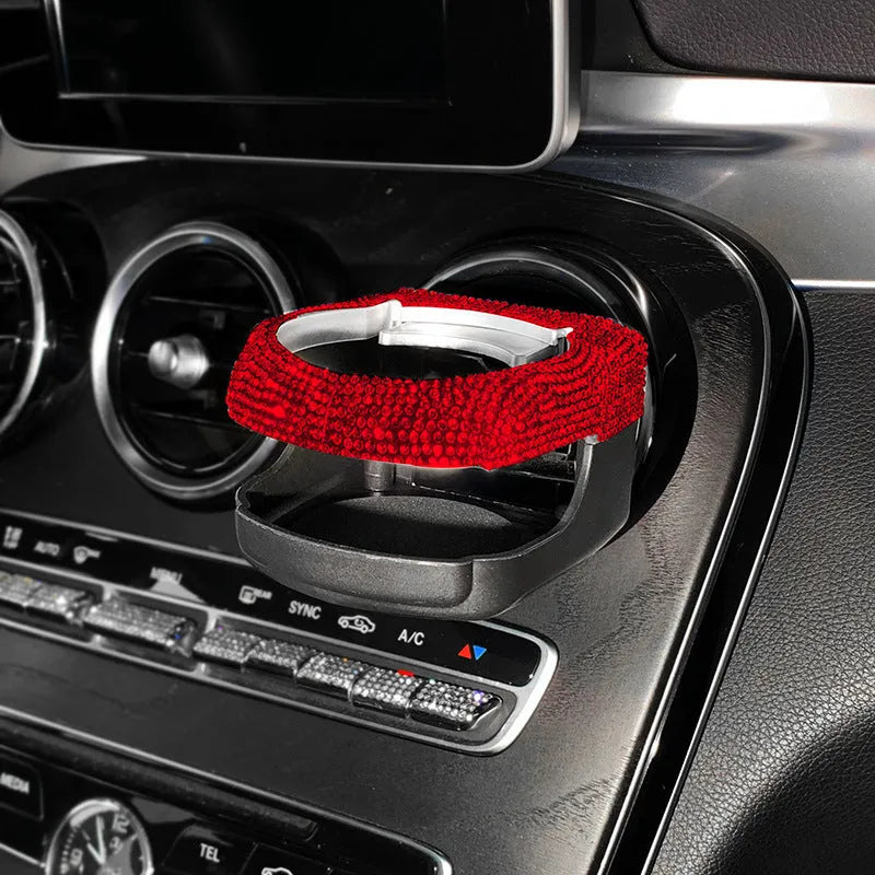 White diamond rhinestone car air vent cup holder bracket showing clip mechanism