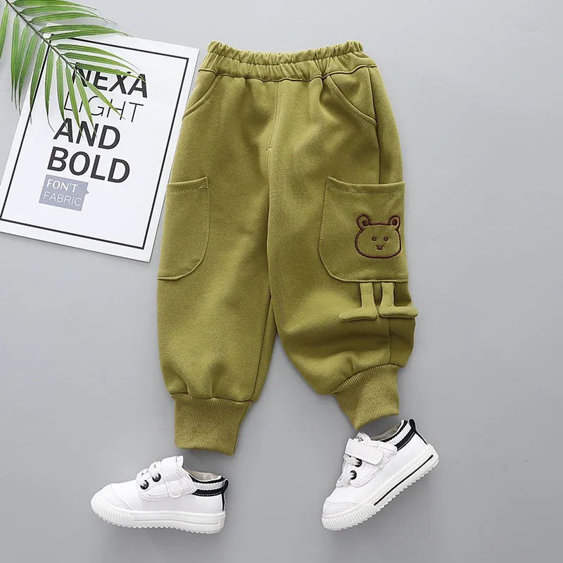 Boys' velvet sport pants in gray, green, and brown with elastic waistband and drawstring