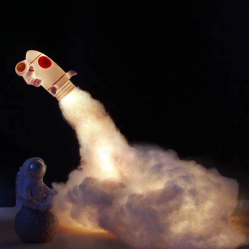 DIY astronaut rocket LED night light kit with warm white string lights and 19cm base, shown disassembled with materials.