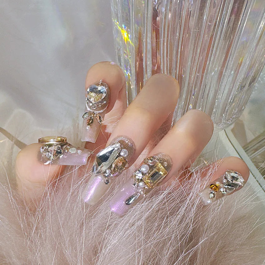 Pack of flash style false nail patches with luxury rhinestones on a card, showing jelly adhesive and tool set options.