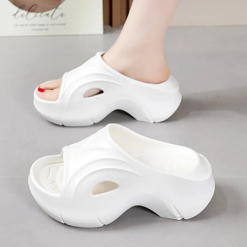 Women's thick-soled EVA slippers in white, black, or rose red with round toe design