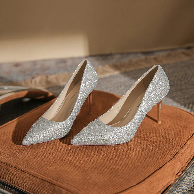 Gold crystal high heel stiletto pump with rhinestone and sequin decoration