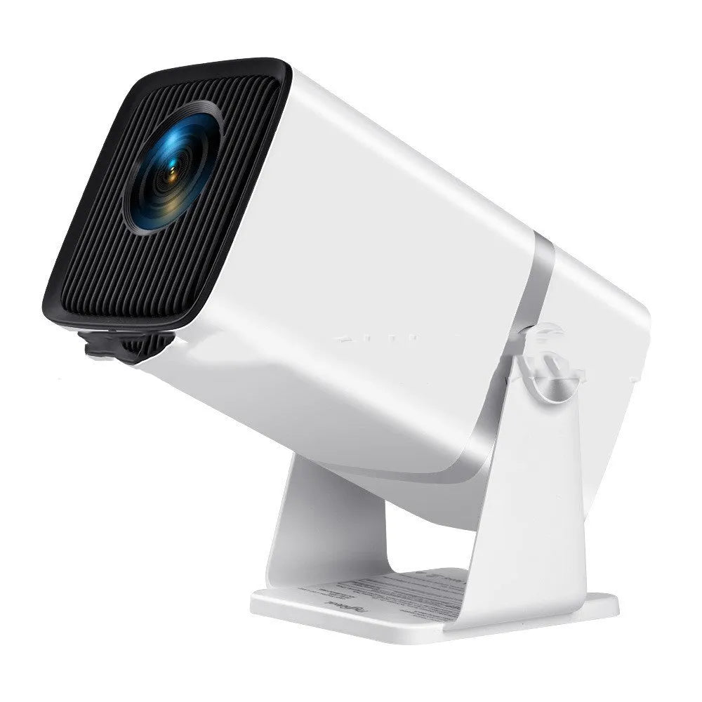 Black portable Full HD projector with Android 13, 11000 lumens, remote control, and power cable on table