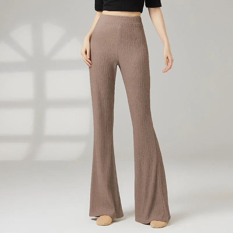 Women's solid colour polyester dance practice pants for classical and sports dance training.