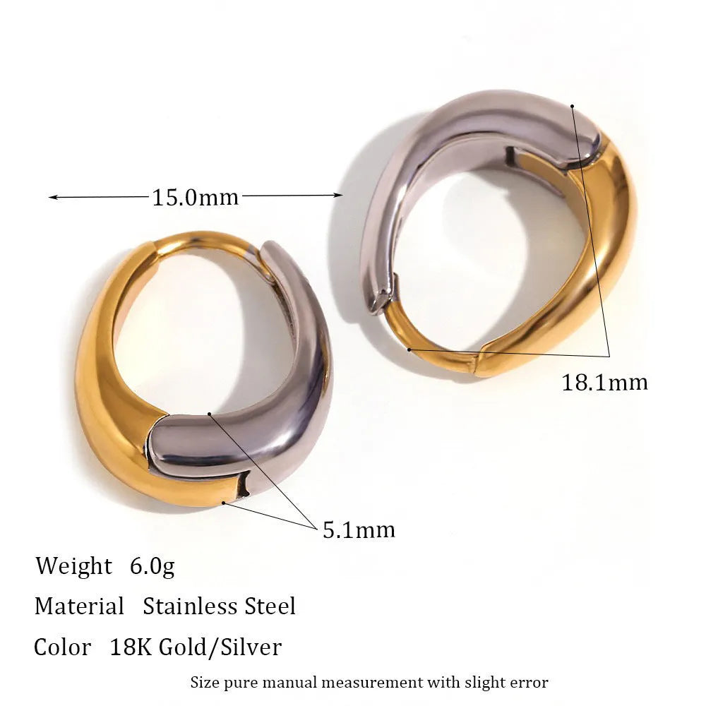 Gold tone electroplated stainless steel jewellery set with geometric shapes including earrings, bracelet and necklace