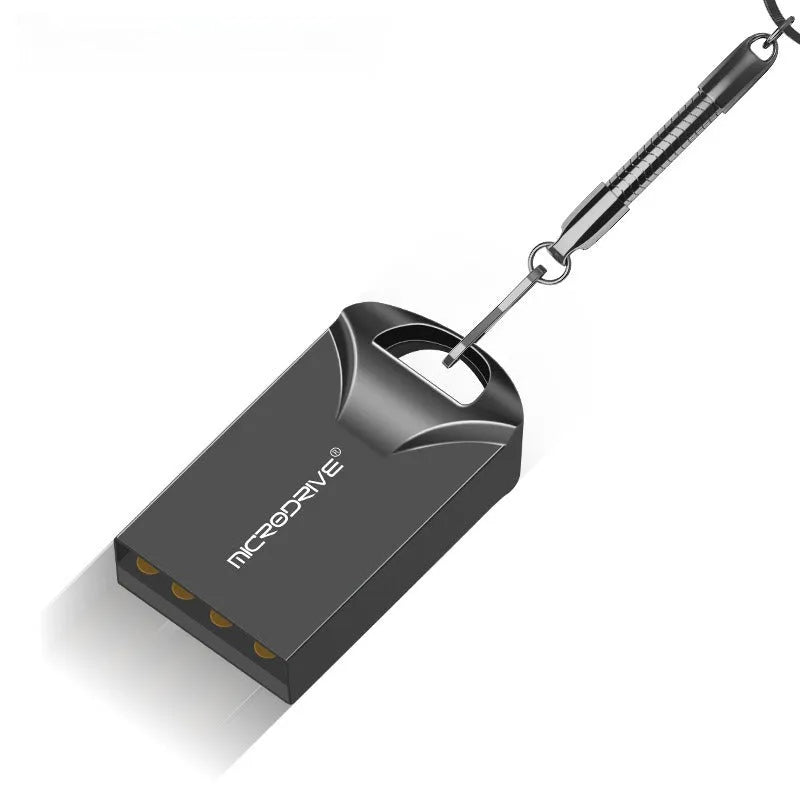 Small black and silver metal USB flash drive on a white background showing its compact size.
