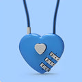 Peach heart shaped wire rope lock in multiple colours with a long steel cable, shown next to a bicycle helmet.