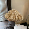 Shell-shaped straw shoulder bag for women with chain strap accents in beige colour