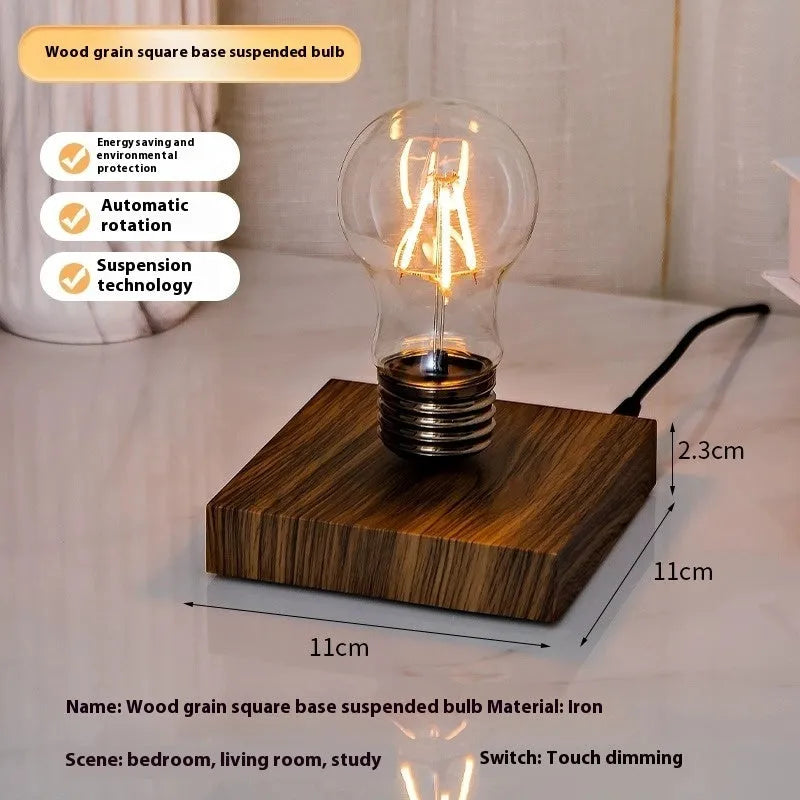 Black iron art suspension bulb night lamp on a wood grain base for desktop decoration.
