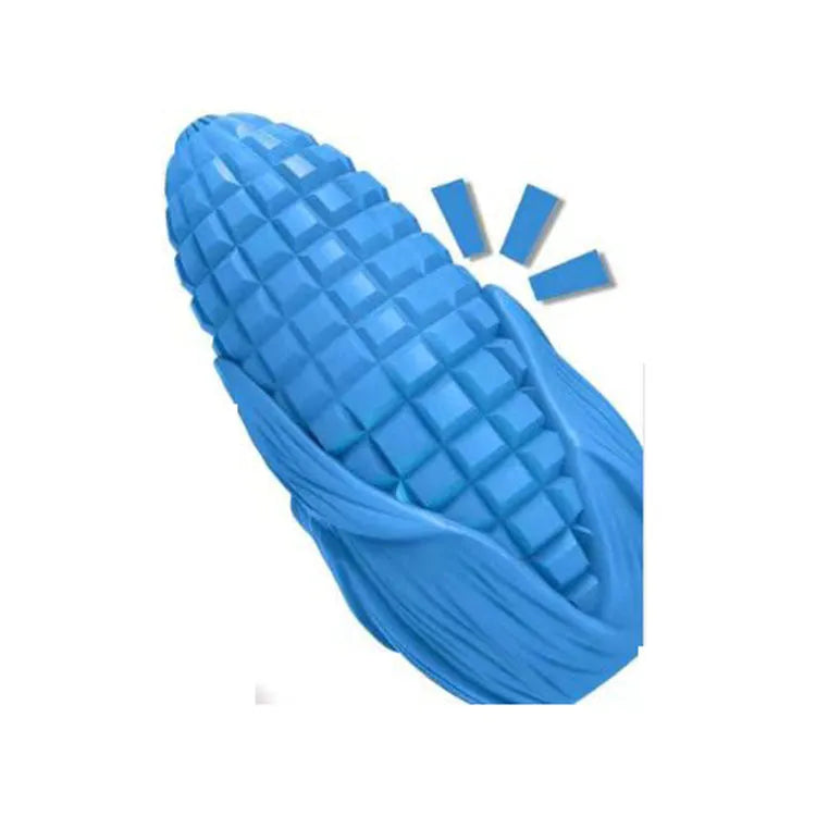 Corn stick shaped dog chew toy with textured surface grooves and squeaky interactive feature
