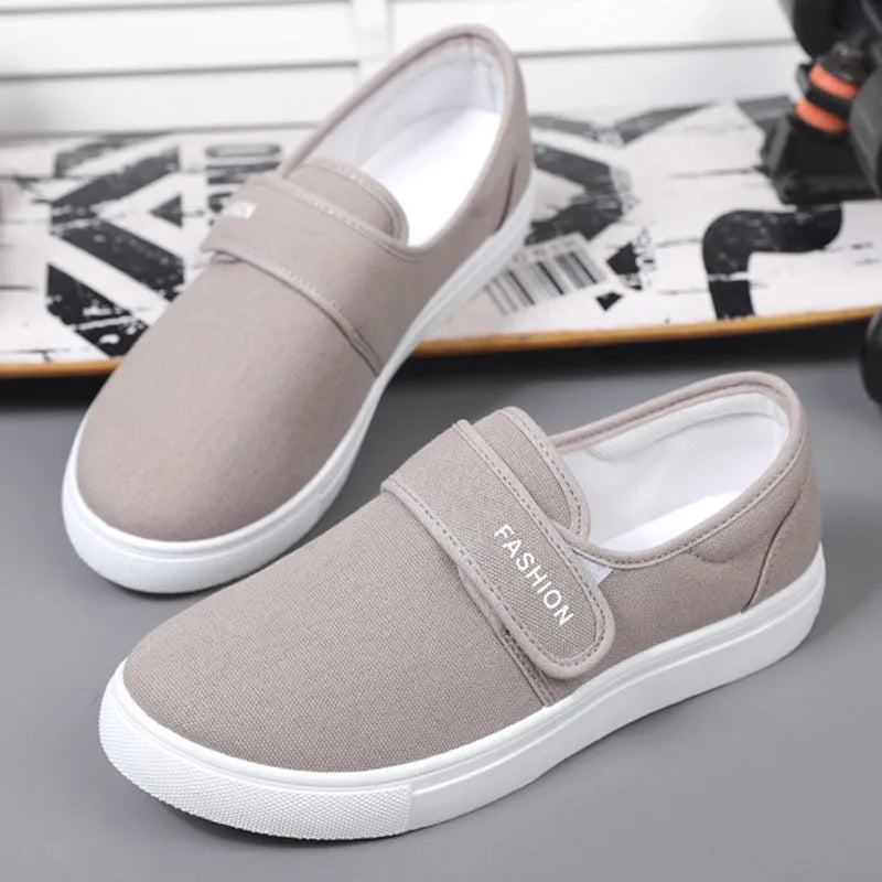 Men's canvas Velcro flat shoes in black low-top style with PVC sole