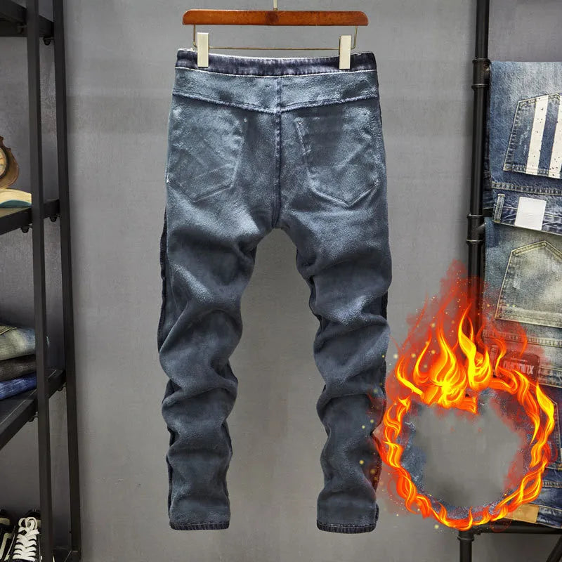 Men's slim-fit skinny jeans in dark blue denim on a neutral background.