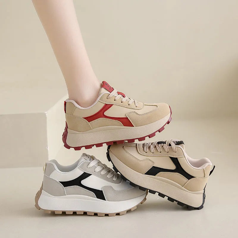 Women's solid colour low-top platform trainers with lace-up front and flat rubber sole