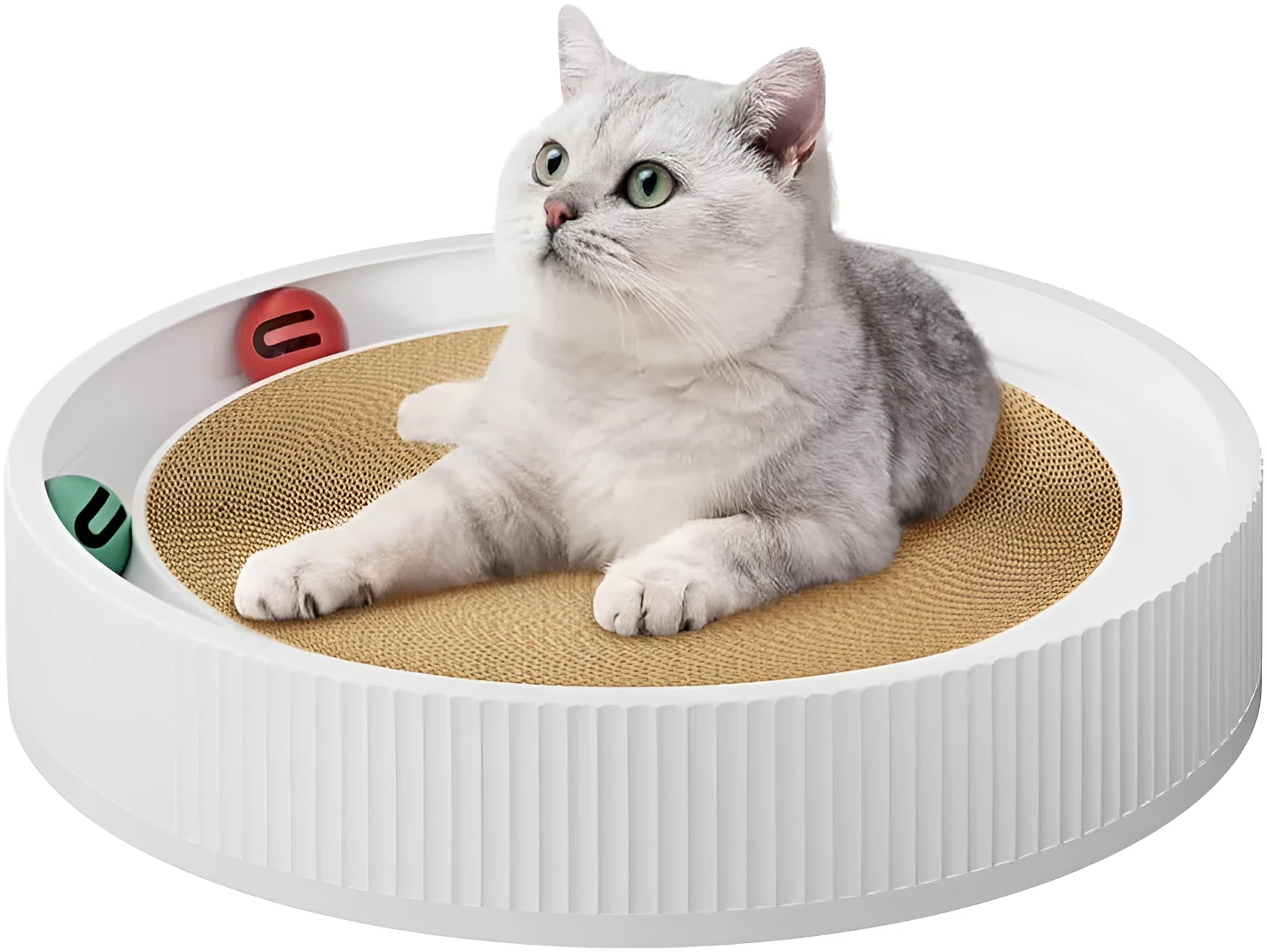 Large green cardboard cat scratching board with three coloured ball toys attached on a flat surface.