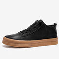 Men's black casual leather shoes with round toe and lace-up lanyard on a white background.