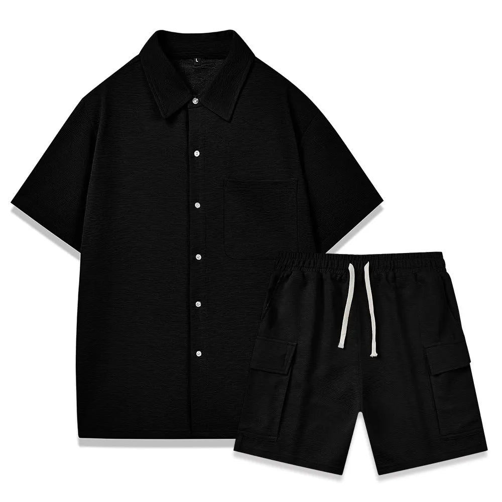 Beige polyester two-piece set with short sleeve top and elastic waist shorts laid flat.