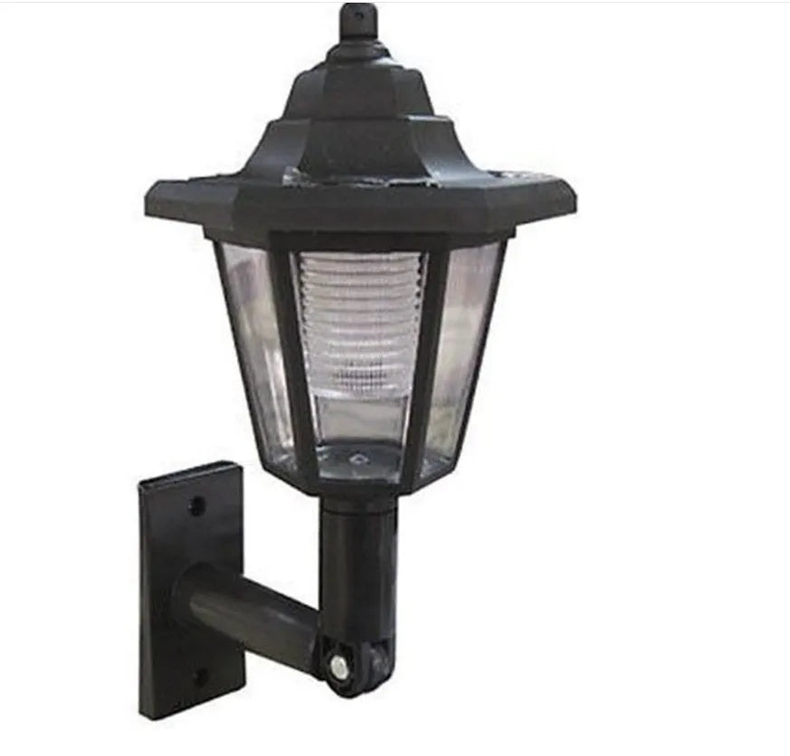 Black hexagonal solar-powered wall lamp with light sensor for outdoor use