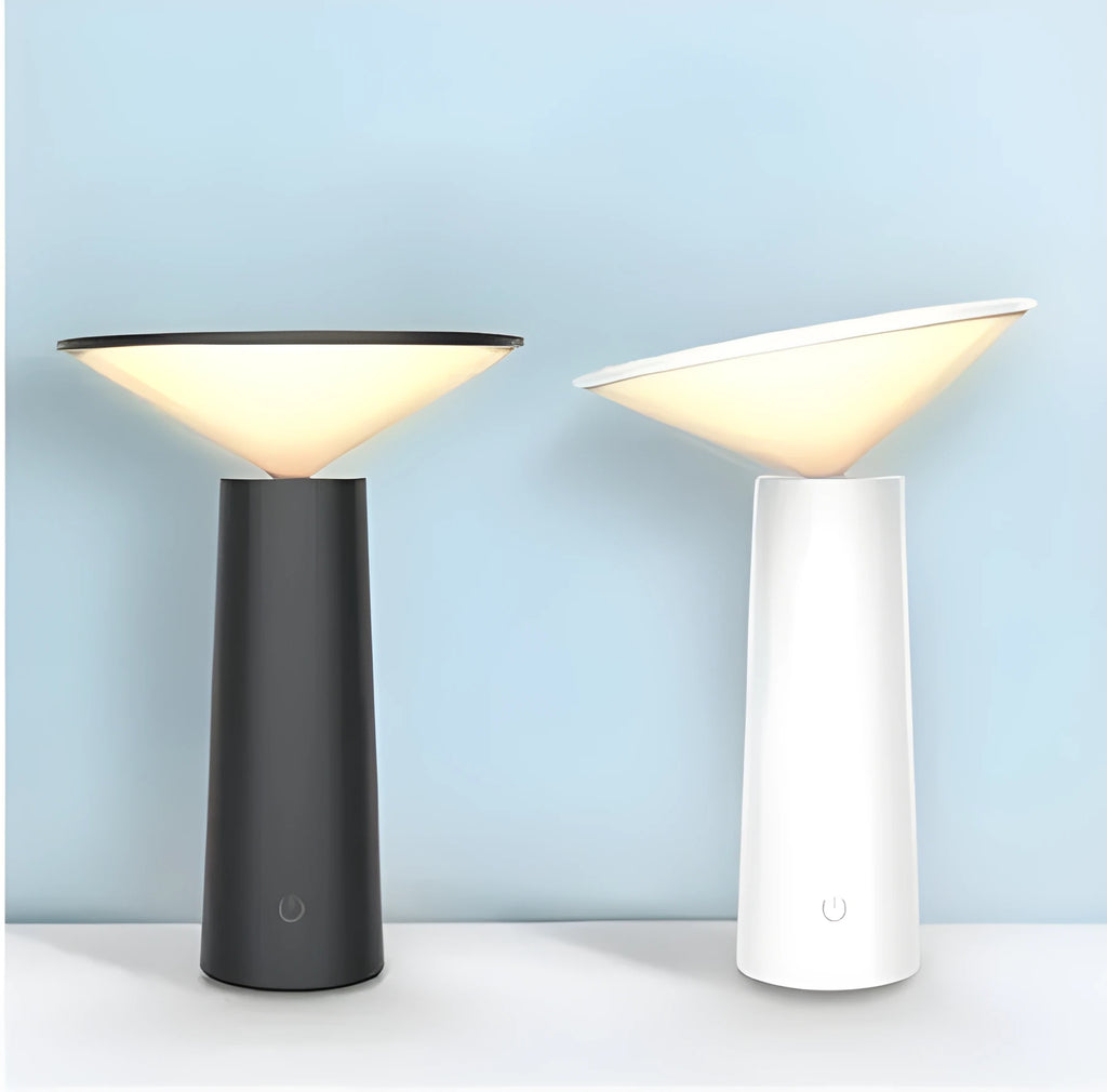 Black USB rechargeable table lamp with adjustable LED reading light head on a desk.