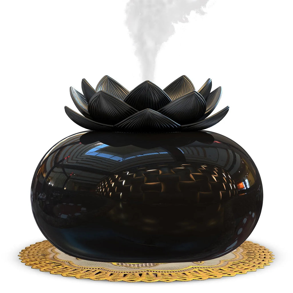 Pure black round USB aromatherapy humidifier with ultrasonic mist outlet.