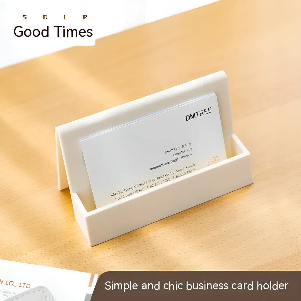 Geometric PS plastic business card stand with 20 slots in brown on a desk