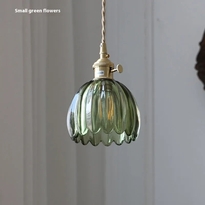 Nordic style bedside chandelier with a vintage glass flower shade in a choice of five colours.