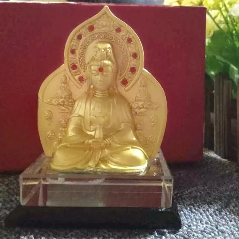 Alloy rotating prayer wheel car decoration in traditional Chinese style on a car dashboard.