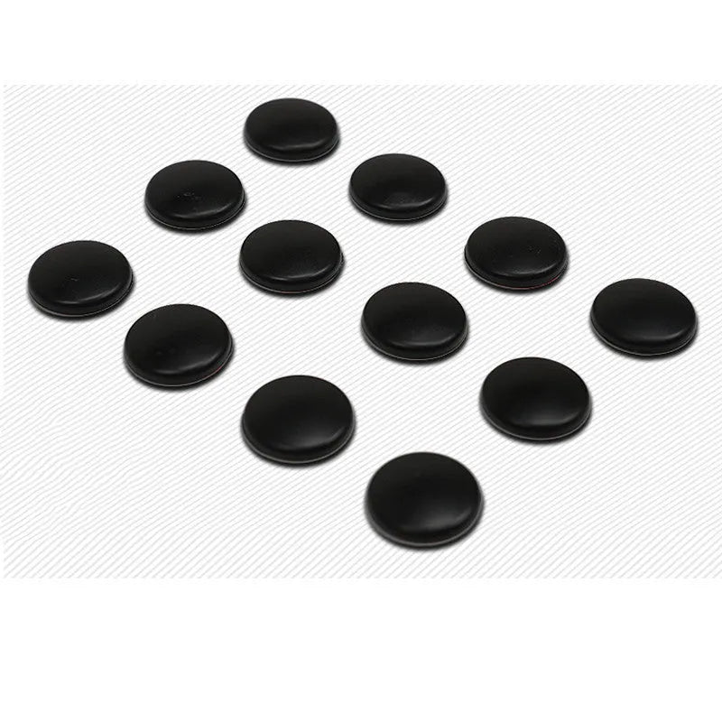 12 black ABS plastic car door screw cap protective covers on a Mazda door panel