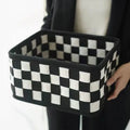 Checkerboard woven felt storage basket showing folding design and 37x29x19.5cm dimensions