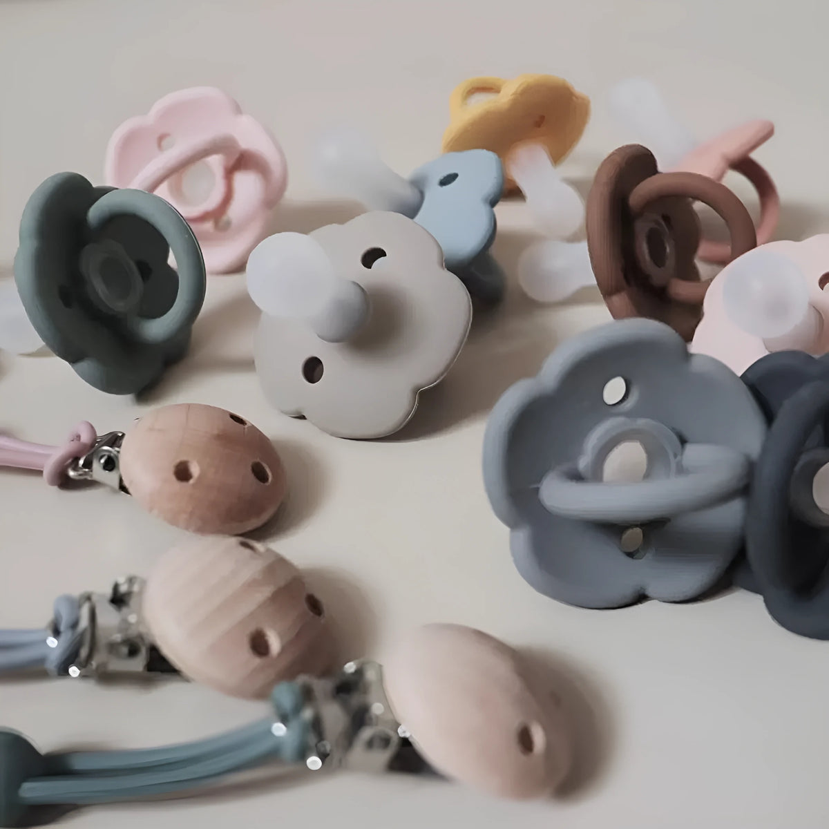 Baby pacifier with silicone lace nipple in 6.5x5x5cm size available in 11 colours for 0-6 months