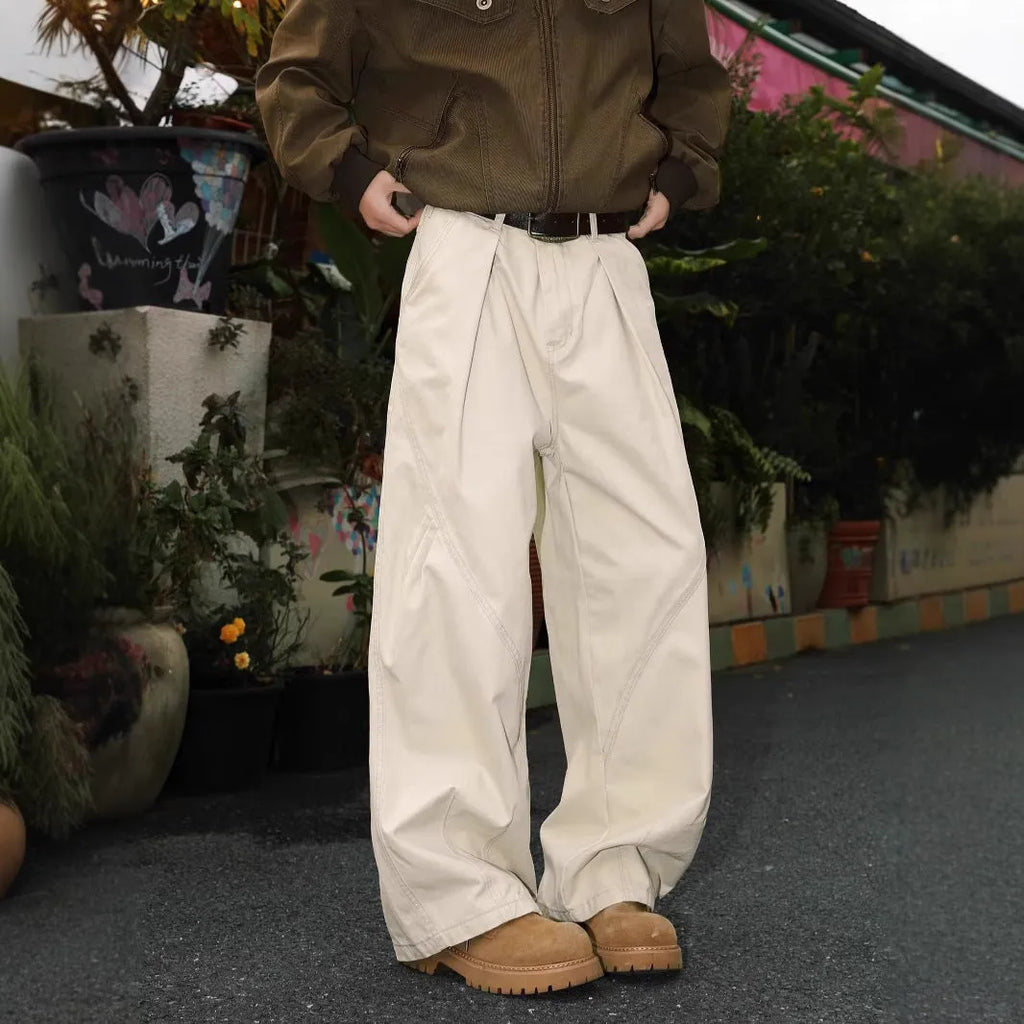 Men's straight leg pleated trousers in apricot colour with elastic waistband