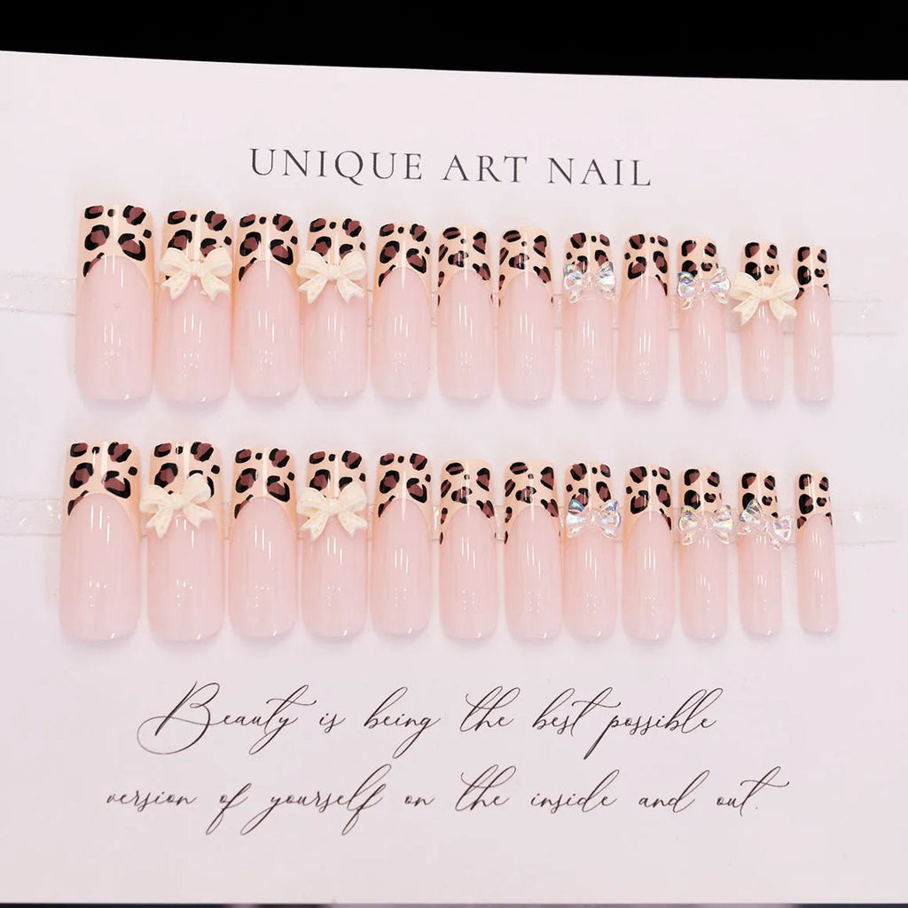 Leopard print false nails with butterfly wing designs, 24 piece plastic nail art set in WM296 colour