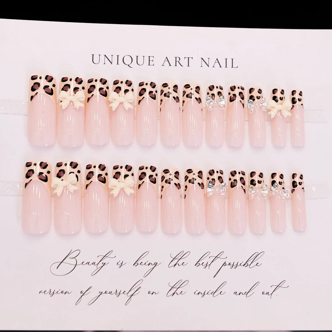 Leopard print false nails with butterfly wing designs, 24 piece plastic nail art set in WM296 colour