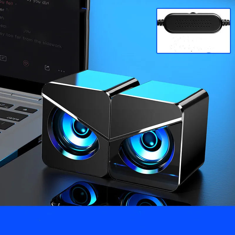 Black USB mini desktop speakers with independent volume knob and wired connection for computer audio