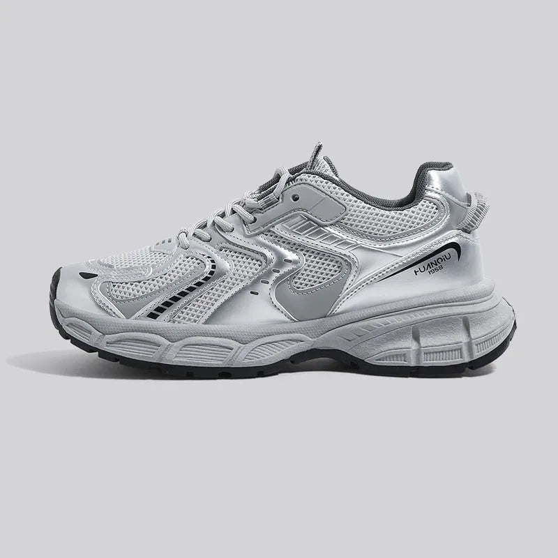 Low-top grey platform casual sneakers with leather stitching on a PU mesh upper and a flat EVA sole.