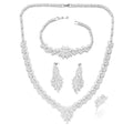 White copper bridal jewellery set with tassel earrings, necklace, bracelet, ring and snake bone chain