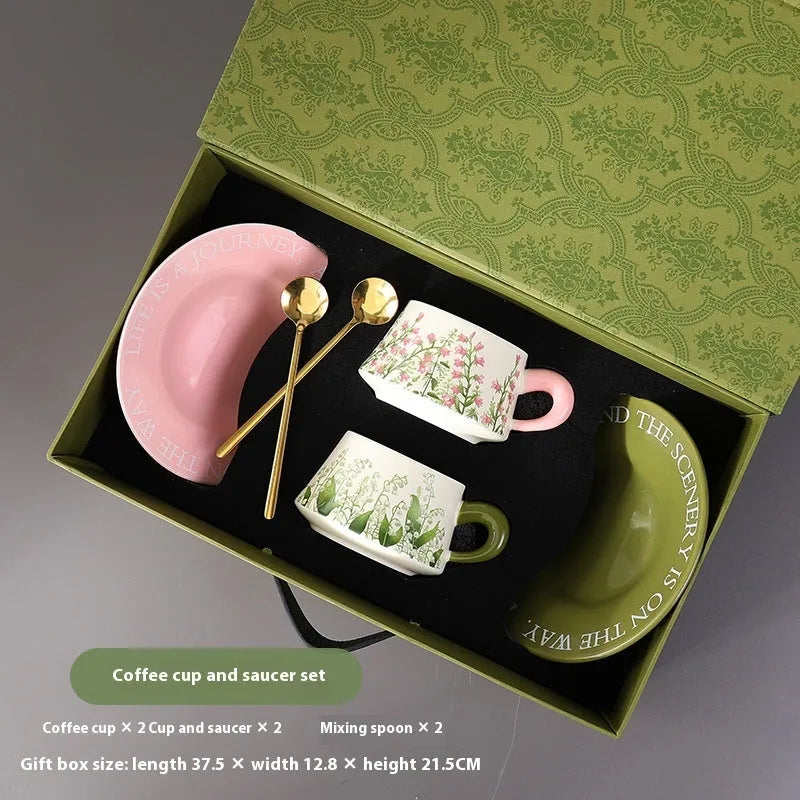 Ceramic coffee cup and saucer set for two with matching spoons in Campanula or Lanling Grass design