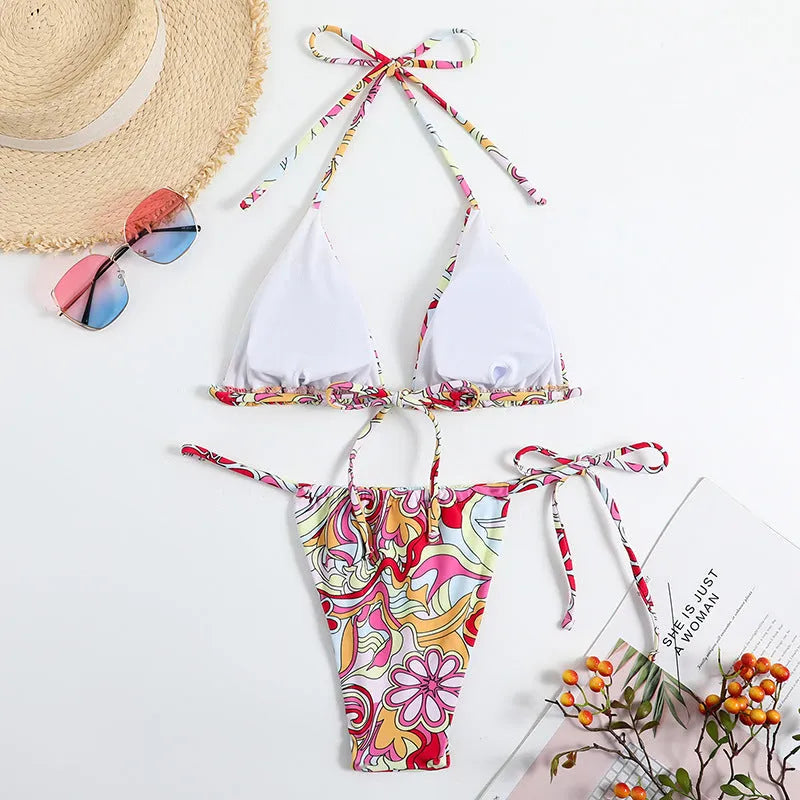 Women's multicolour triangle print bikini with hanging neck design and separate bottoms