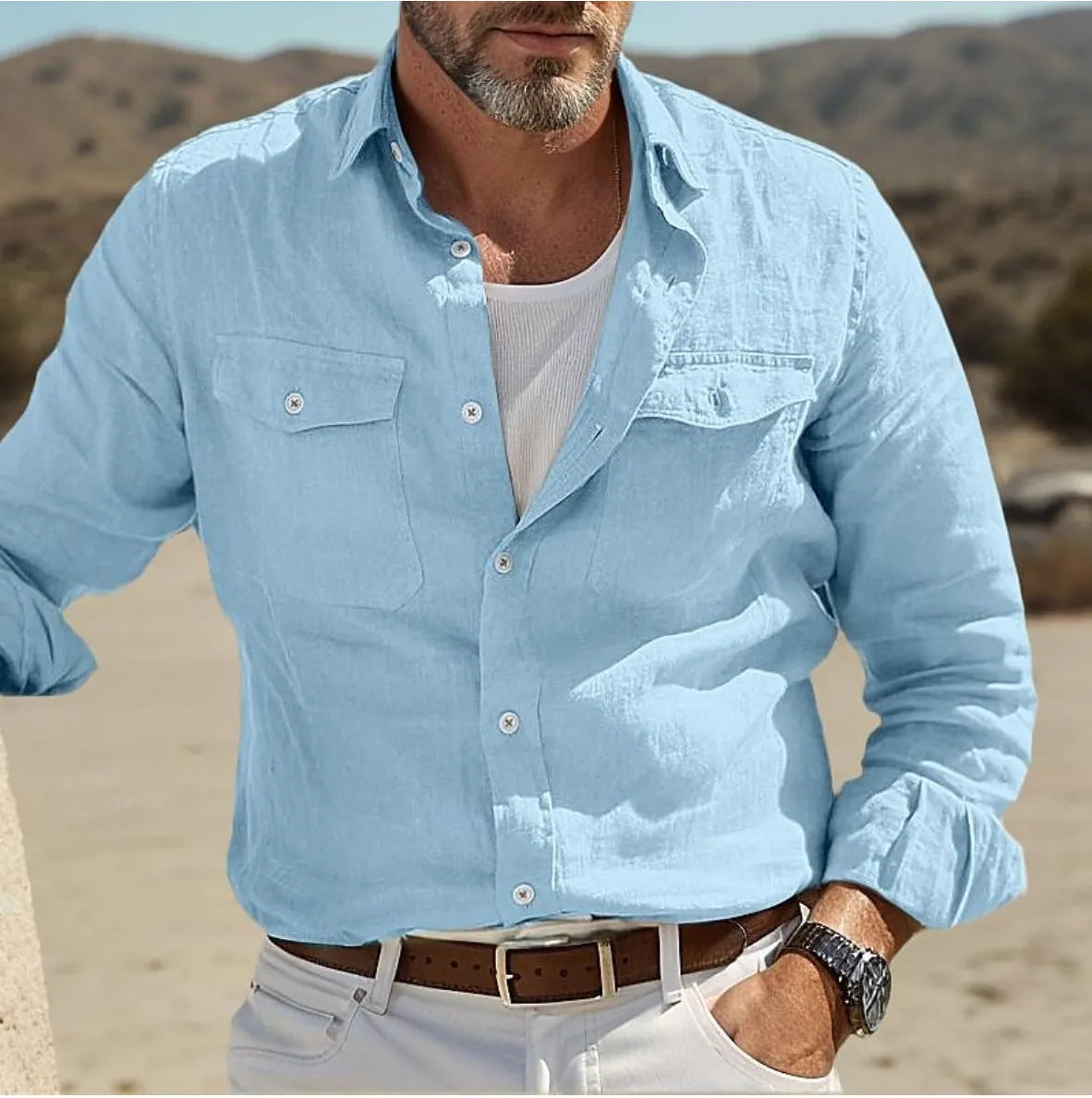 Man wearing a green loose-fit cotton linen long-sleeved summer casual shirt