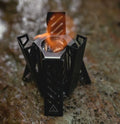Hexagon foldable alcohol stove for outdoor camping in black or silver colour with compact mini size