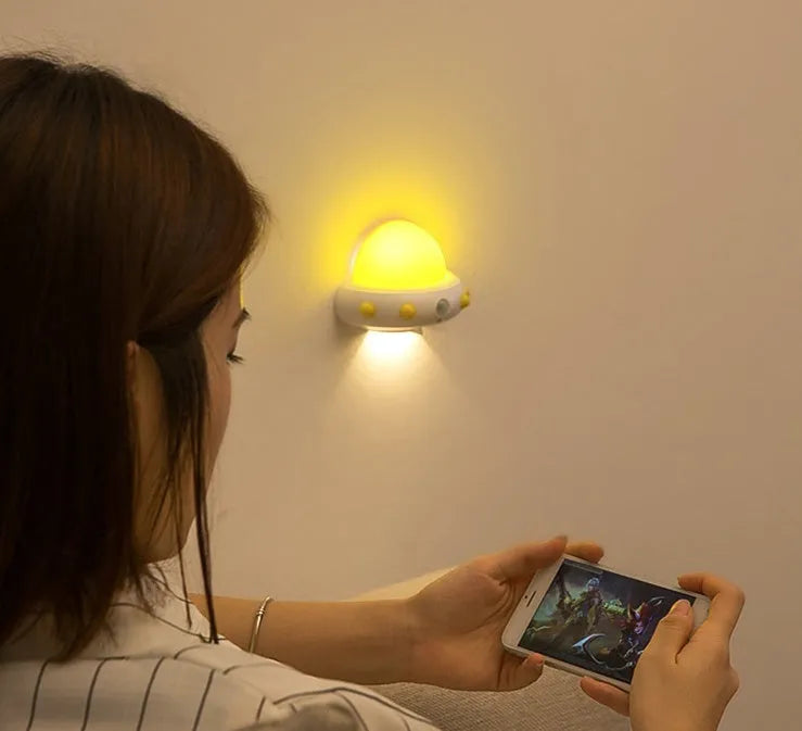 Remote control UFO shaped bedside night light in blue, pink, or white colour options