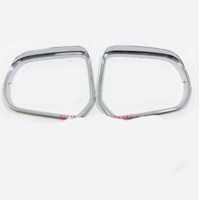 Pair of plastic rearview mirror protection covers with tremella pattern in silver and black finishes.