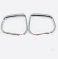 Pair of plastic rearview mirror protection covers with tremella pattern in silver and black finishes.