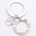 Who Rescued Who dog lover alloy keyring in white electroplated finish