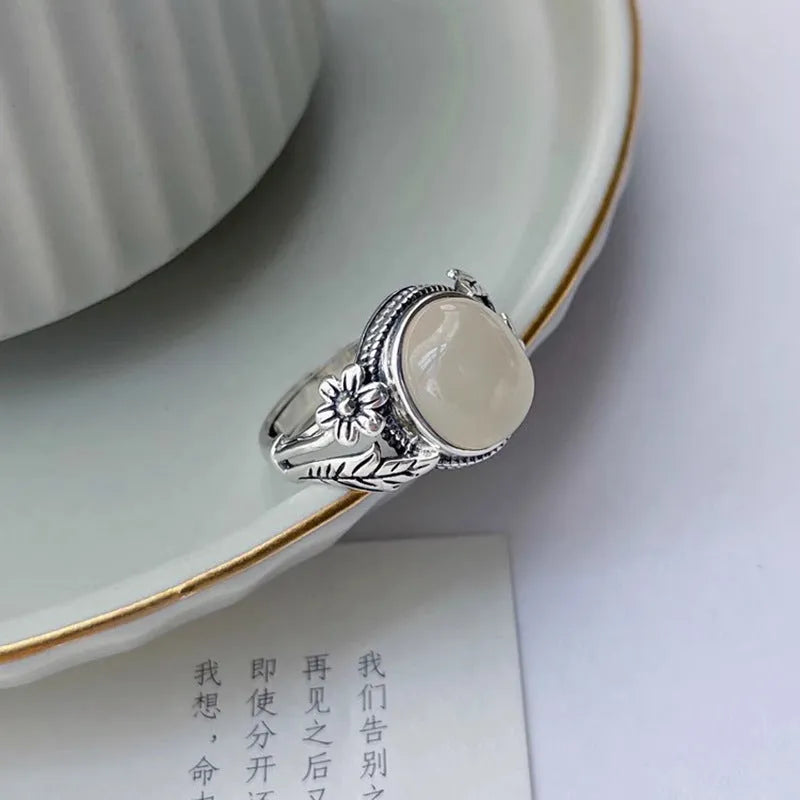 Copper vintage ring with imitation white chalcedony stone and adjustable open mouth design